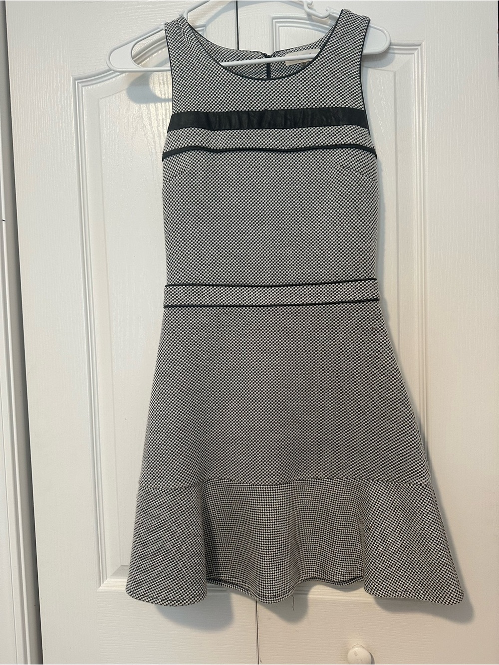 Classic Black & White Sleeveless Fit-and-Flare Dress leather detail